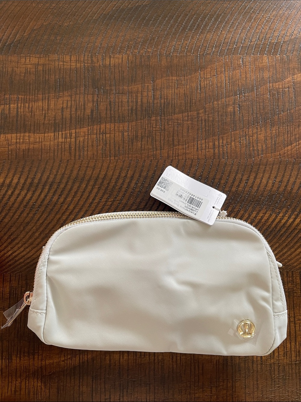 lululemon athletica Cream Belt Bag with Gold Emblem